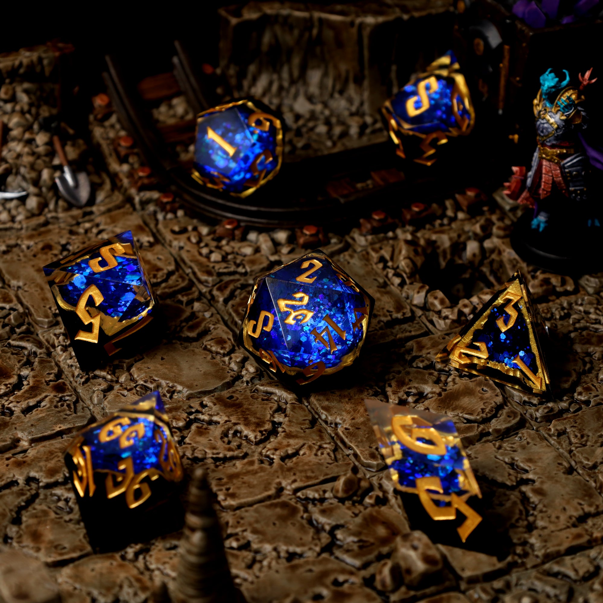 Azure Artifacts geode dice, gold-rimmed blue crystal core