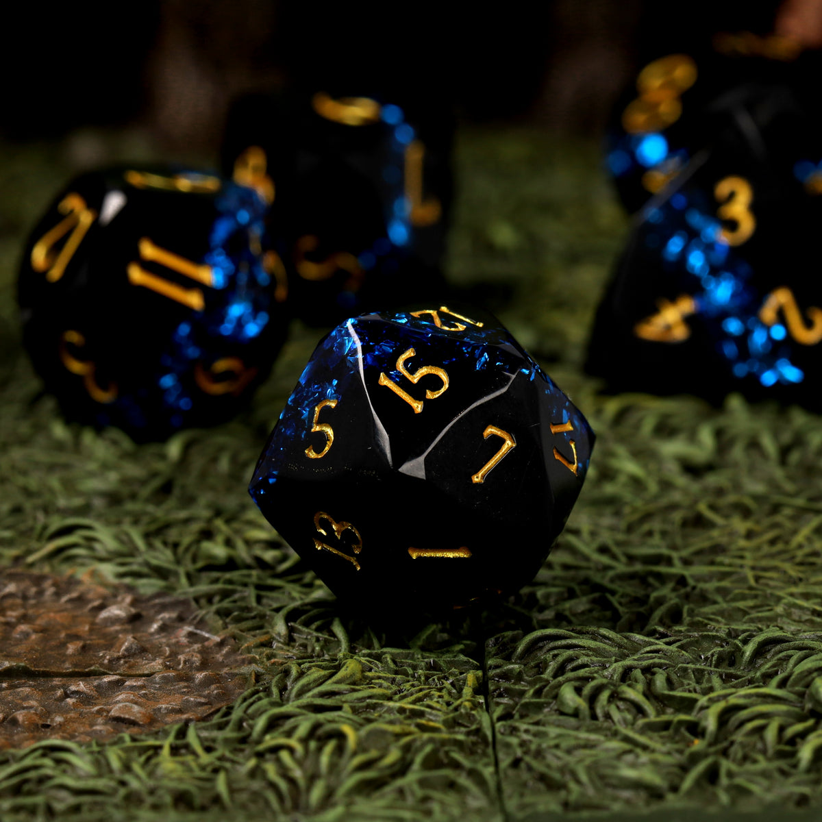 Glacier Gale d20 close-up, black resin with a blue mica band