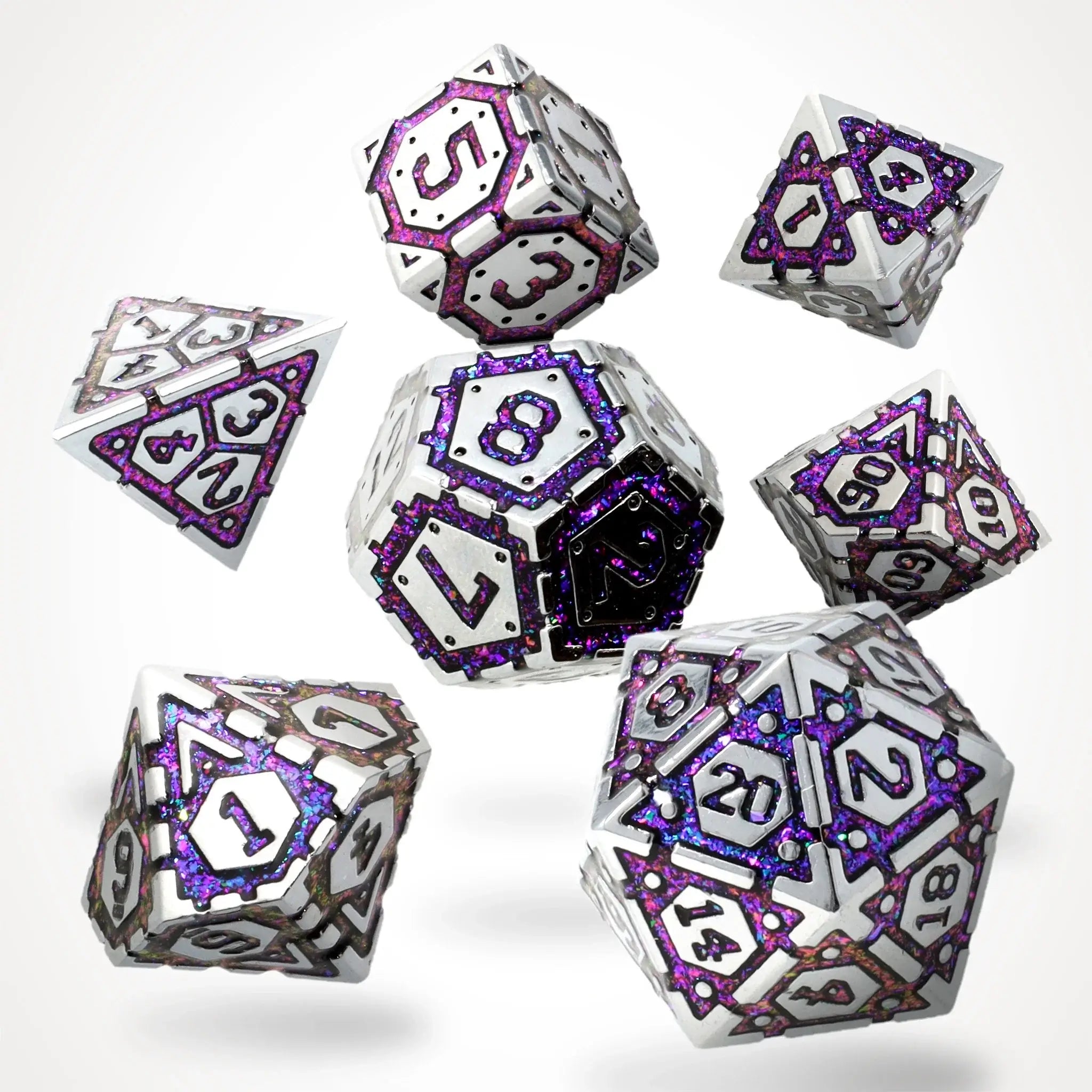 Set of metallic dice with purple and silver accents on a white background