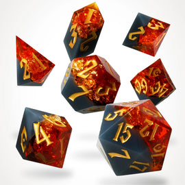 Volcanic Amber sharp-edge resin RPG dice set, full 7-piece spread