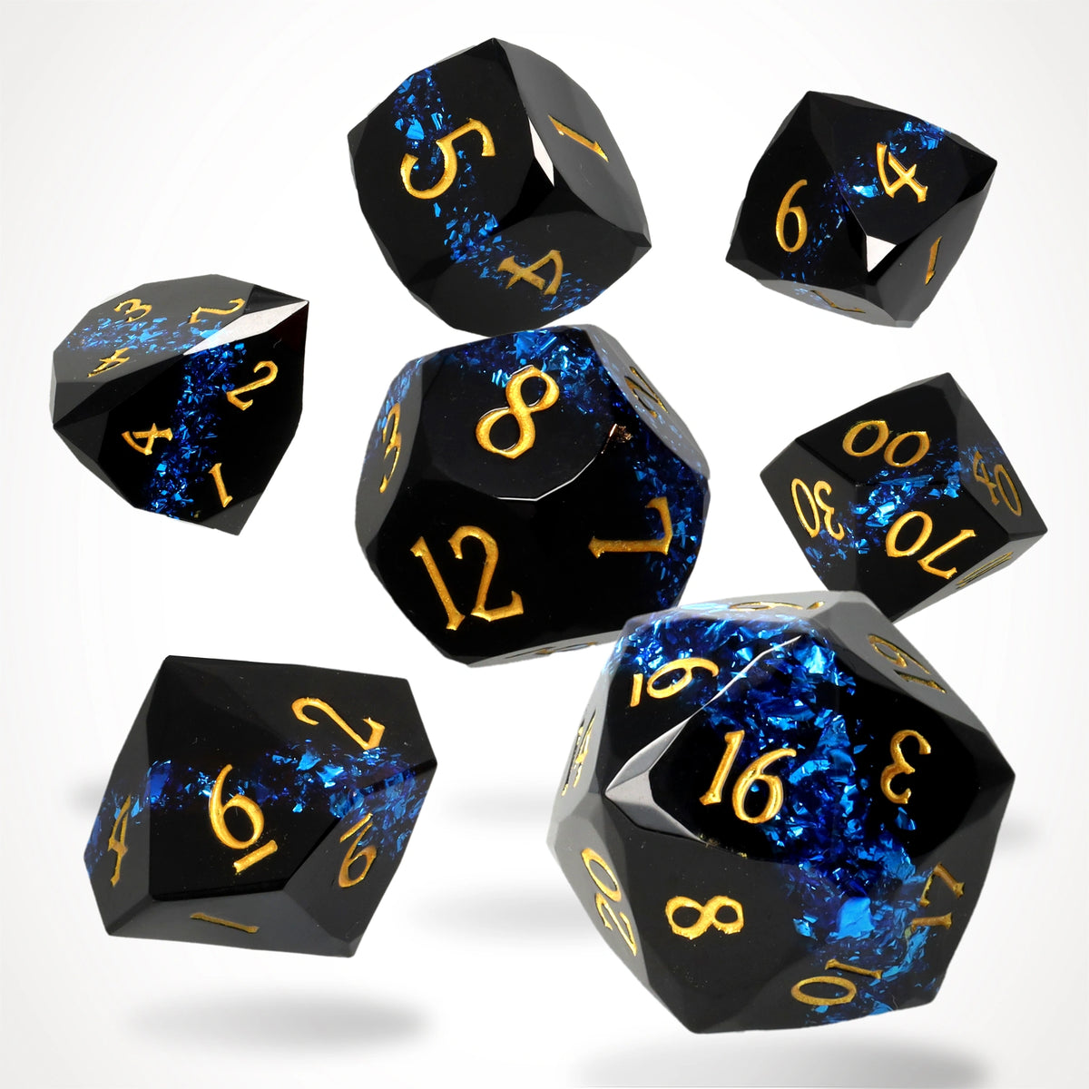 Glacier Gale Resin RPG Dice Set: seven black gem-cut resin dice with a blue mica band and gold numbers