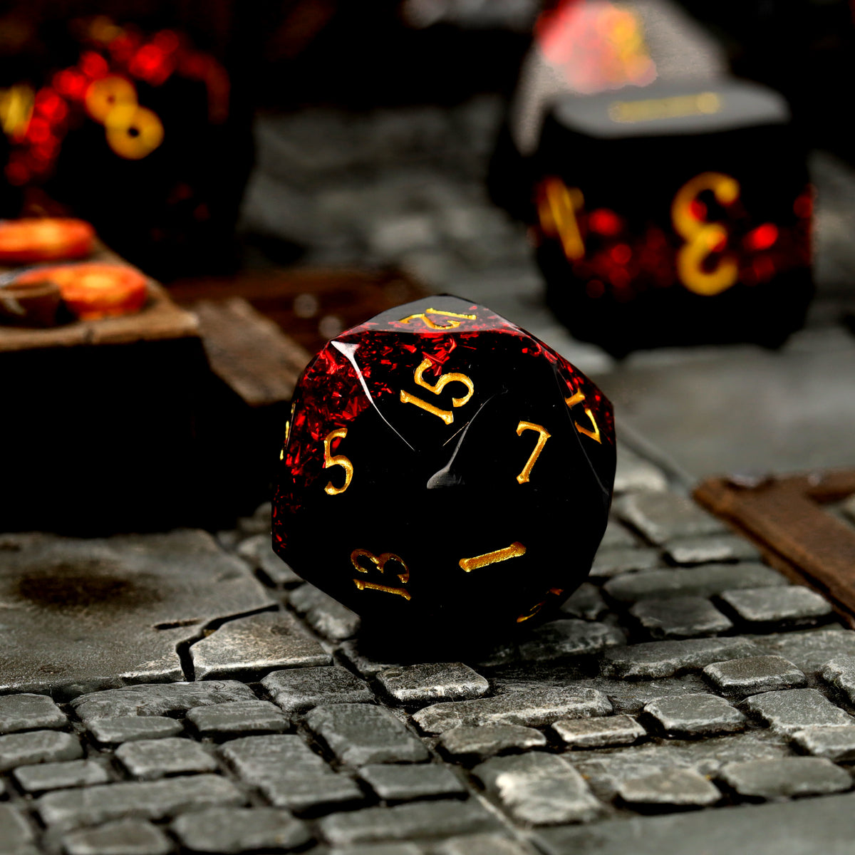 Sanguine Seam d20 close-up, black resin with a red mica band