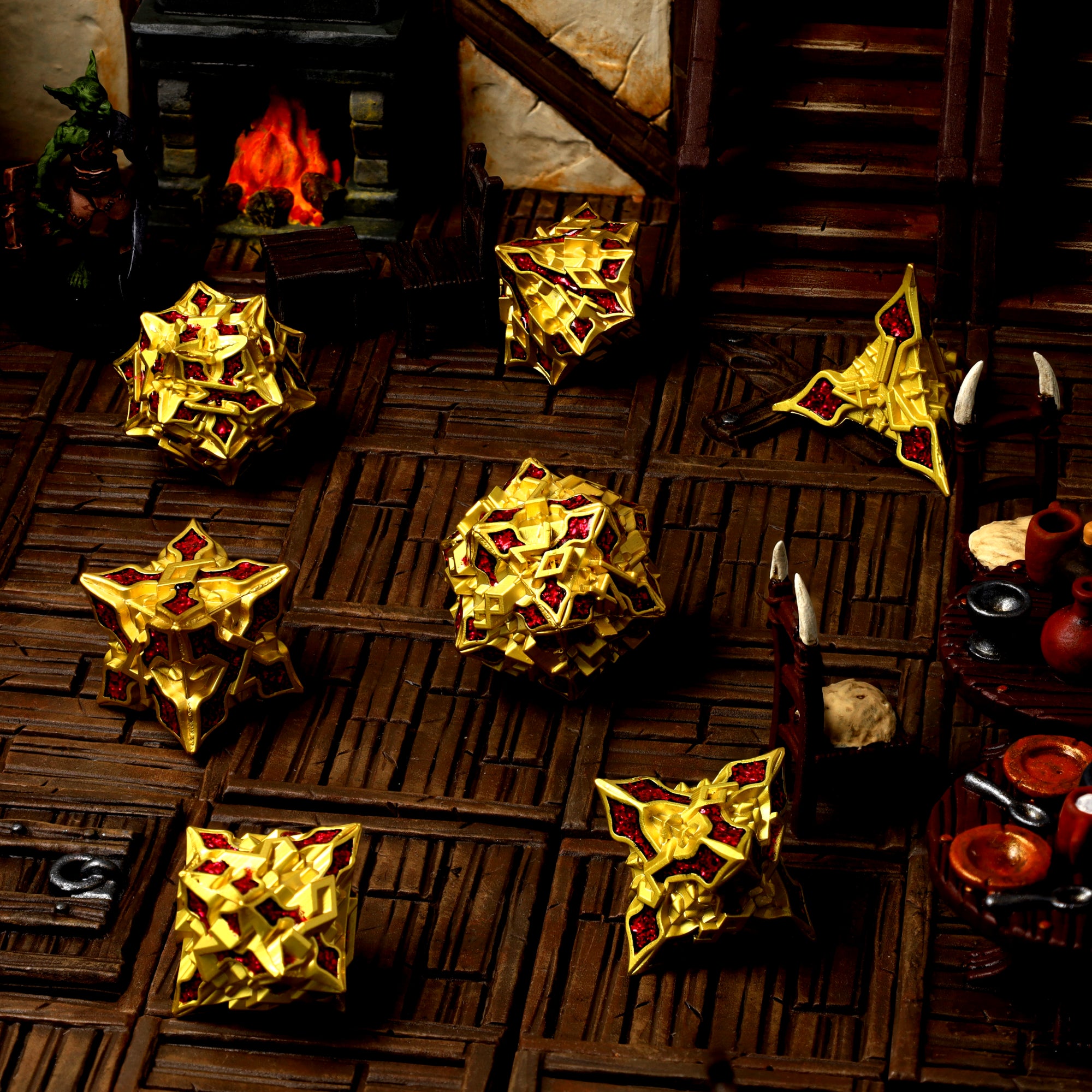 Royal Alloy metal RPG dice set, gold with red glitter inlay, tavern scene