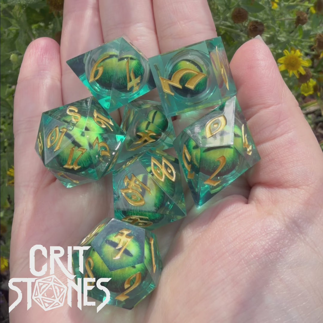 Forest Dragon's Gaze Floating Eye RPG Dice Set — dice in motion