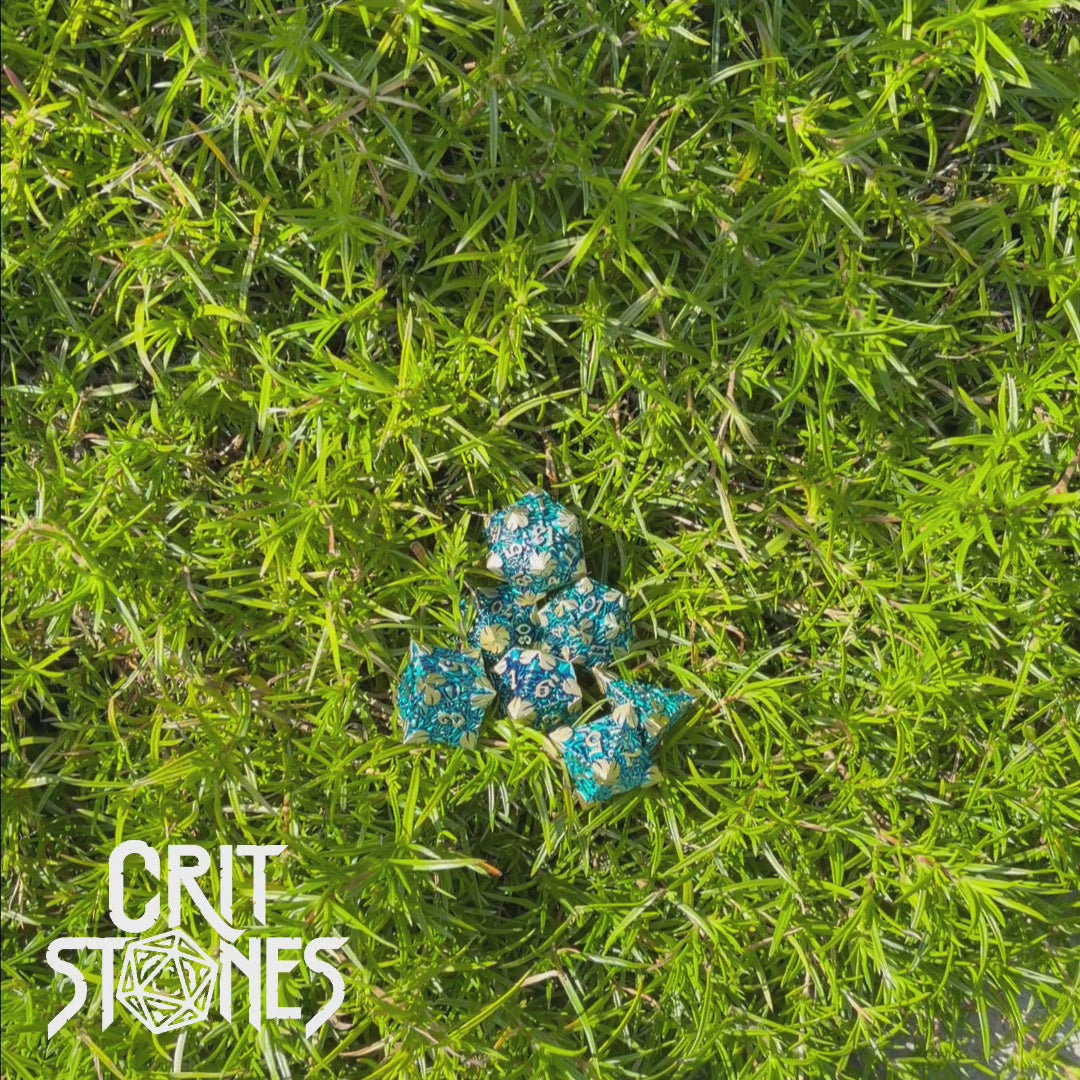 Golden Canopy Metal RPG Dice Set — dice in motion